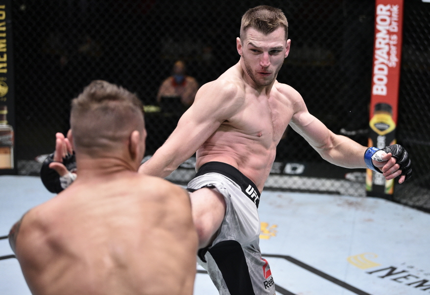 ▲ 댄 후커 vs 더스틴 포이리에 / 사진 제공=UFC